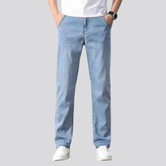 Thin men's stretch jeans