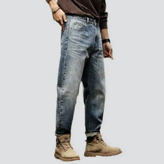 Whiskered men's loose jeans