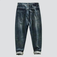 Whiskered dark-wash jeans for men