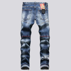 Mid-waist men's paint-splatter jeans