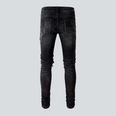 Pink patch men's biker jeans