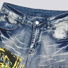 Ripped blue flame print jeans for men