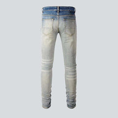 Orange patch knees men's jeans