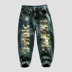 Baggy men's distressed jeans