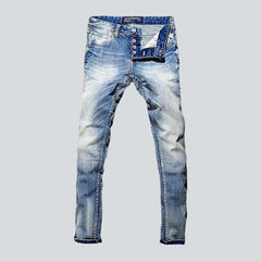 Casual whiskered jeans for men