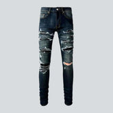 Distressed grunge jeans for men