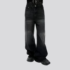Floor-length whiskered jeans