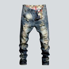 Fully distressed jeans for men