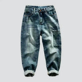 Moderate-dye mid waisted jeans for men