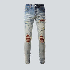 Orange patch knees men's jeans