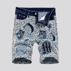 Ornamented men's mid-rise jeans