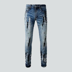 Painted men's light-wash jeans