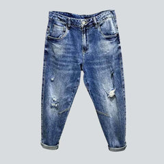 Ripped light blue men's jeans