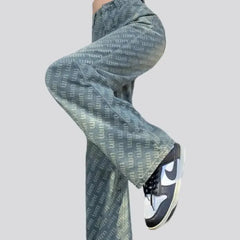 Wide-leg ornament-print jeans