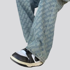 Wide-leg ornament-print jeans