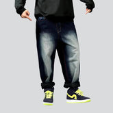 Sanded dark-wash jeans for men