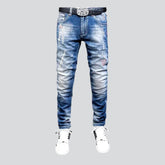 Sanded men's whiskered jeans