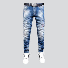 Sanded men's whiskered jeans