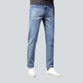 Tapered stonewashed jeans for men