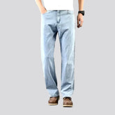 Thin men's whiskered jeans