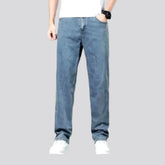 Thin stonewashed jeans for men