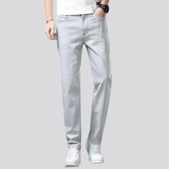 Loose men's light-grey jeans
