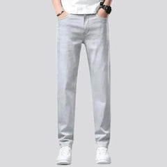 Loose men's light-grey jeans