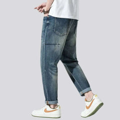 Baggy men's sanded jeans