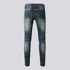 Distressed grunge jeans for men