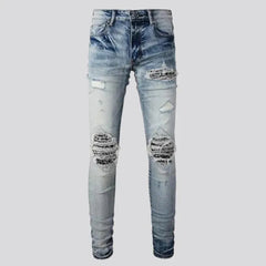Patchwork men's whiskered jeans