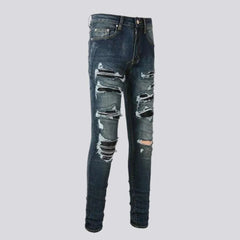 Distressed grunge jeans for men