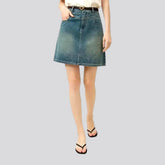 Micro length stylish stonewashed denim skirt