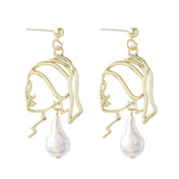 The girl with a pearl "earrings"