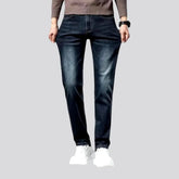 Stretchable dark fading jeans for men