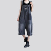 Trendy ripped women's denim bib