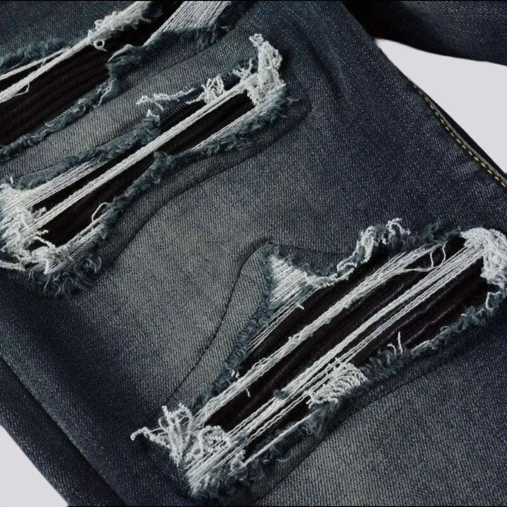 Distressed grunge jeans for men