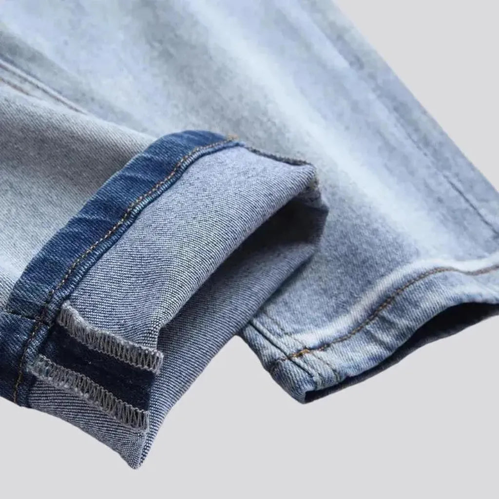 Light-wash color-patches jeans