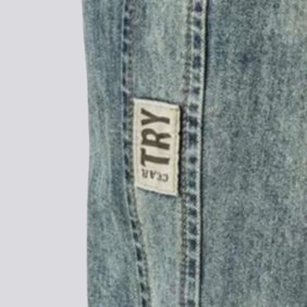 Whiskered sanded jeans for men