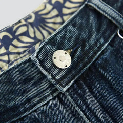 Medium-wash men's mid-waist jeans