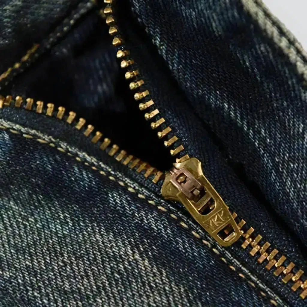 Yellow-cast medium-wash jeans for men