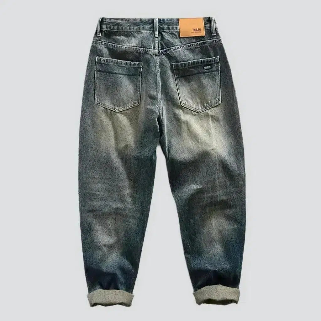 Yellow-cast medium-wash jeans for men
