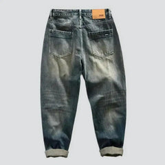 Yellow-cast medium-wash jeans for men