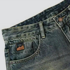 Yellow-cast medium-wash jeans for men