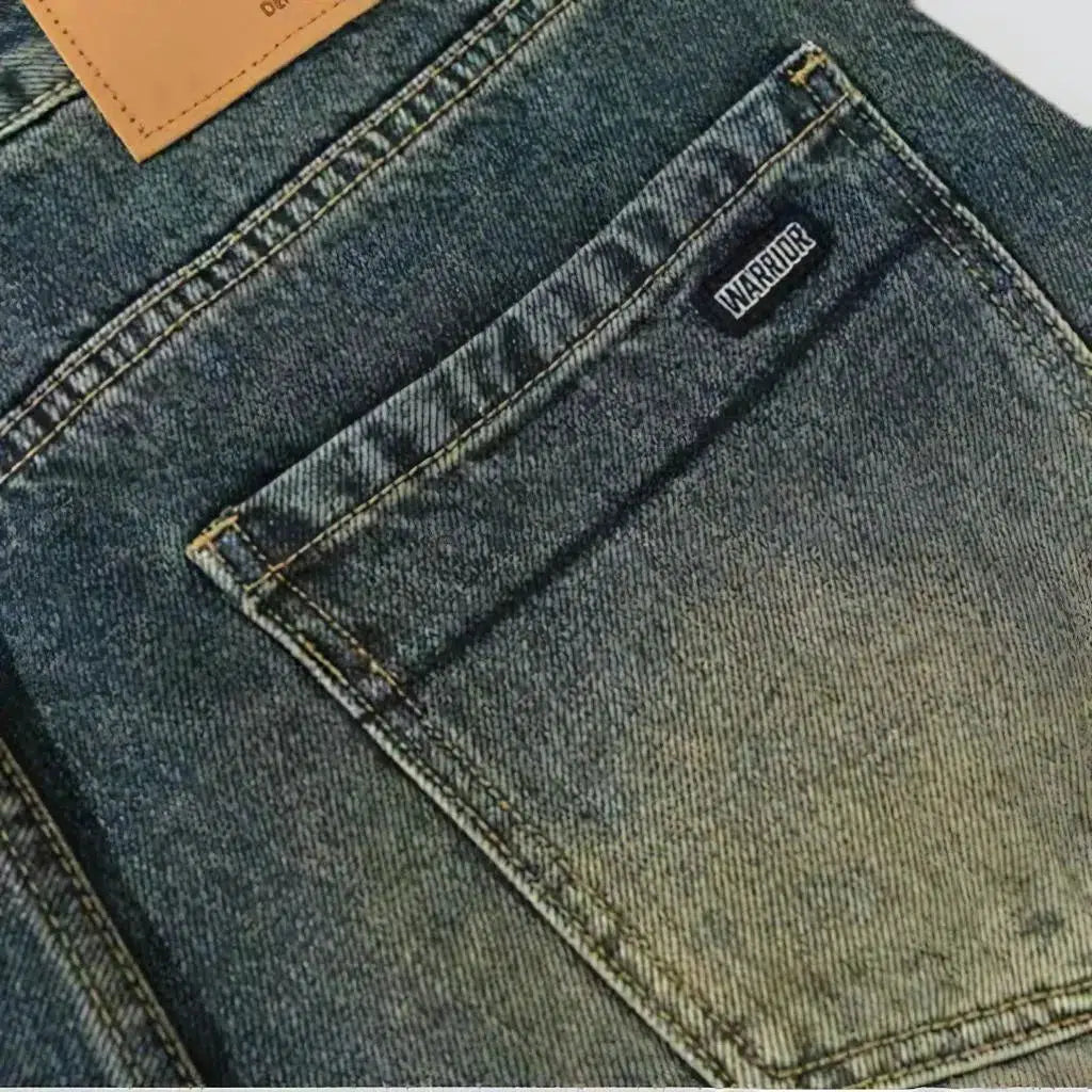 Yellow-cast medium-wash jeans for men