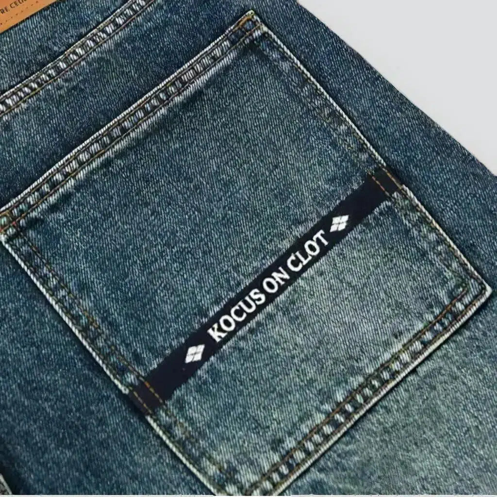 Moderate-dye mid waisted jeans for men