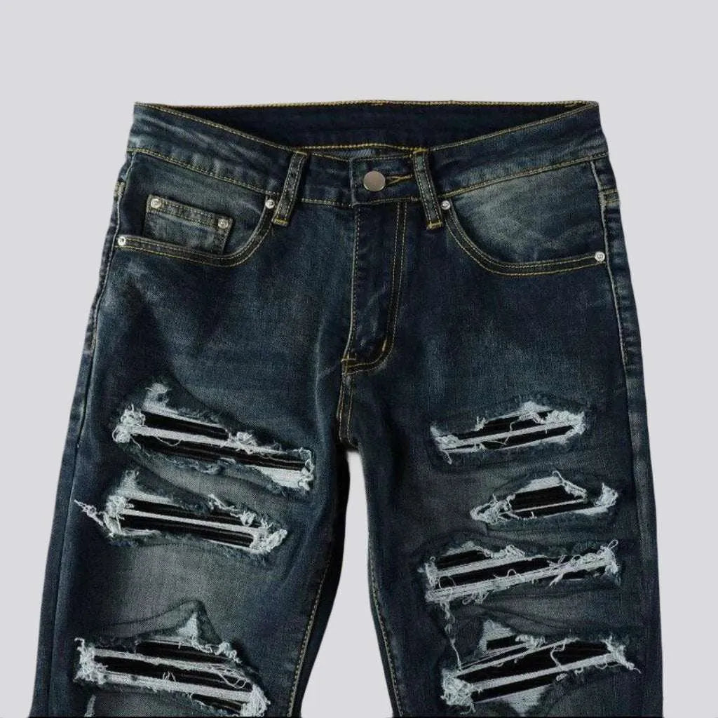 Distressed grunge jeans for men