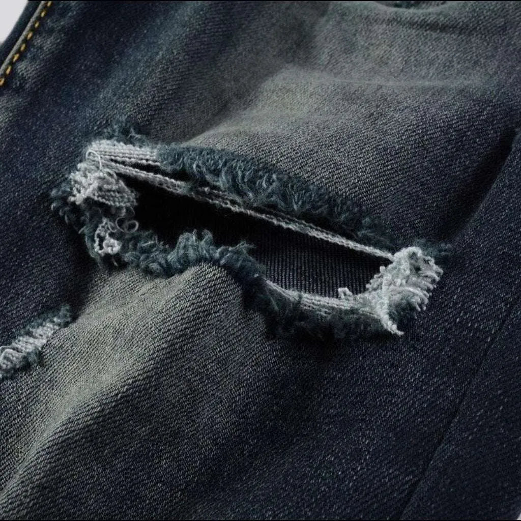 Distressed grunge jeans for men