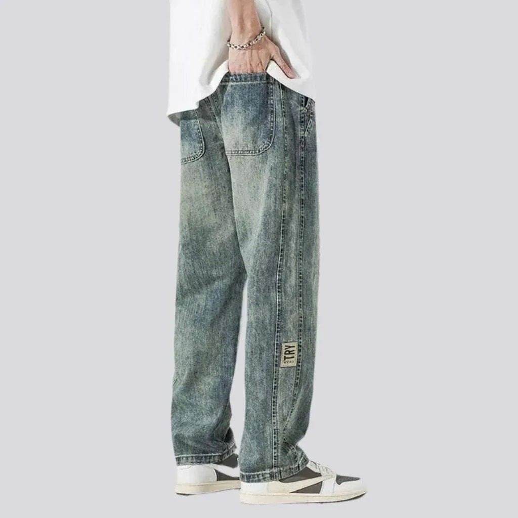 Whiskered sanded jeans for men
