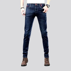 Fitted mid rise elastic men's jeans