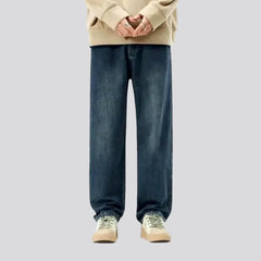 Mid-rise abraded baggy jeans for men